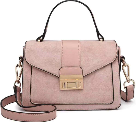 Elevate your everyday look with the KONO Women's Elegant PVC Faux Leather Handbag — a compact yet spacious bag designed for the modern woman who values both style an